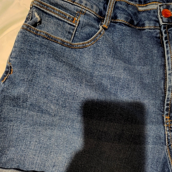 Blue denim distressed jean shorts. Size 34. - Picture 3 of 8